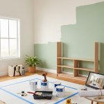 A room with paint cans and various tools scattered across the floor, indicating a painting project in progress
